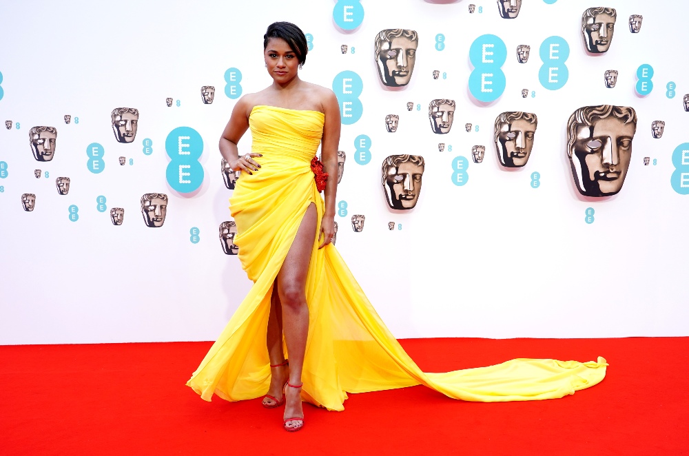 Ariana DeBose looked ready for summer in her bright yellow strapless gown, by Oscar de la Renta, making sure she stood out amongst a crowd that was adorned in muted colours for the most-part.