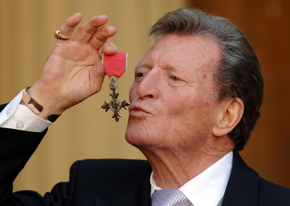 Johnny Briggs after collecting his MBE from Queen Elizabeth II in March 2007 / Picture Credit: Fiona Hanson/PA Archive/PA Images