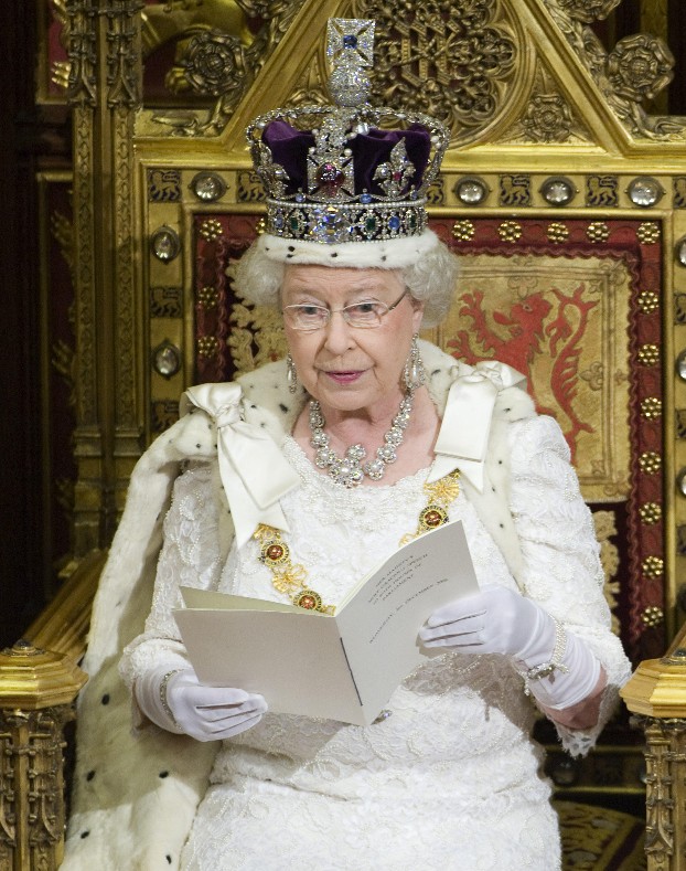 Queen Elizabeth II at the State Opening of Parliament in December 2008, adorned in the crown jewels.  / Picture Credit: PA Images/Alamy Stock Photo