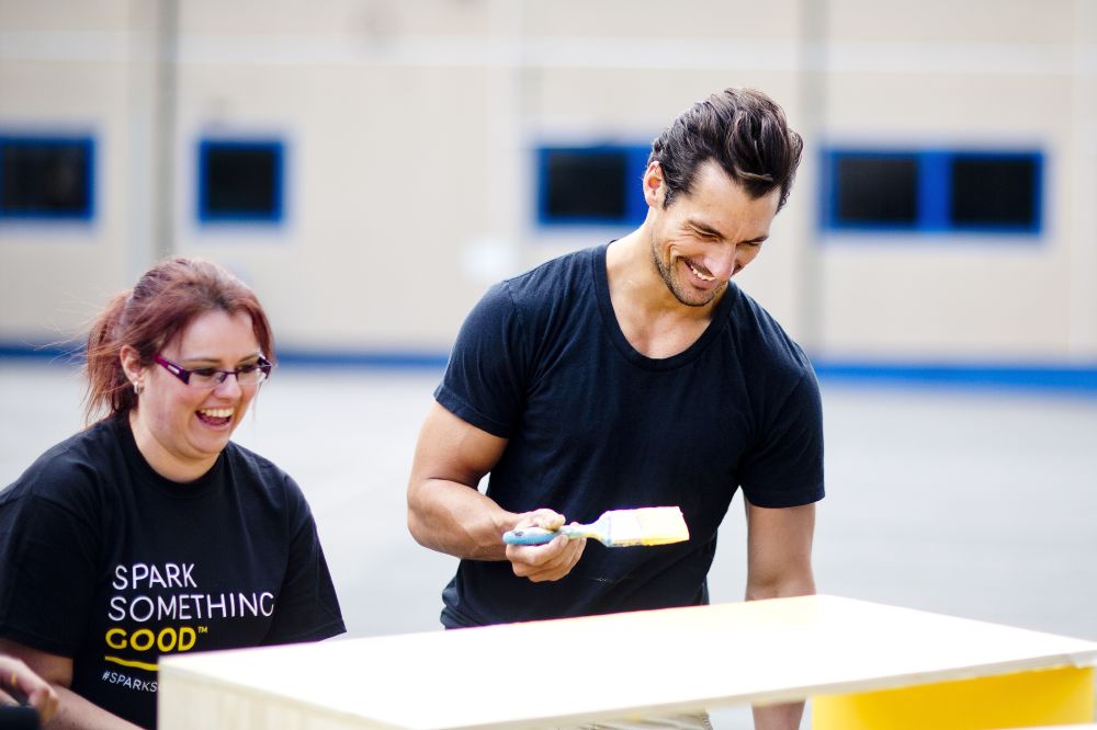 LONDON, ENGLAND – JULY 30TH: David Gandy gets creative at a school in Camden as he helps spray paint up-cycled furniture for a school in London for Spark Something Good, a new M&S initiative that will see 24 projects in the capital be transformed in just 24 hours to inspire the nation to donate their time to local communities (Photo by David Bebber / REX Features)