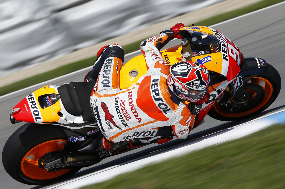 Marc Marquez starts testing his current 2014 motorcycle in the morning.