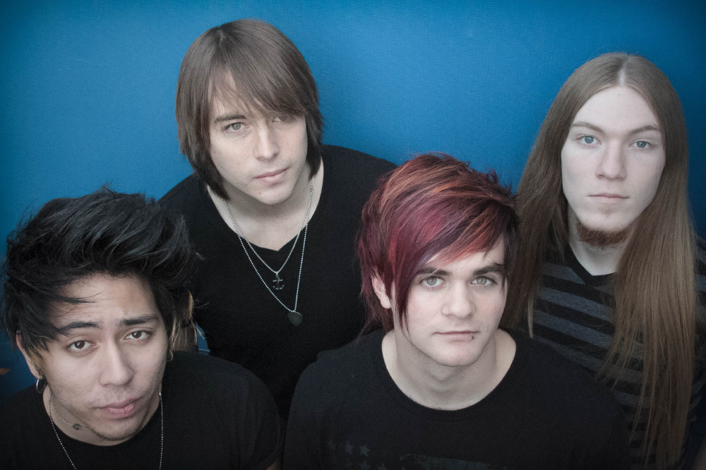 Symmetry are Michael Campbell (vocals), Jared Hara (guitar), Will Weiner (bass) and Max D’Anda (drums)