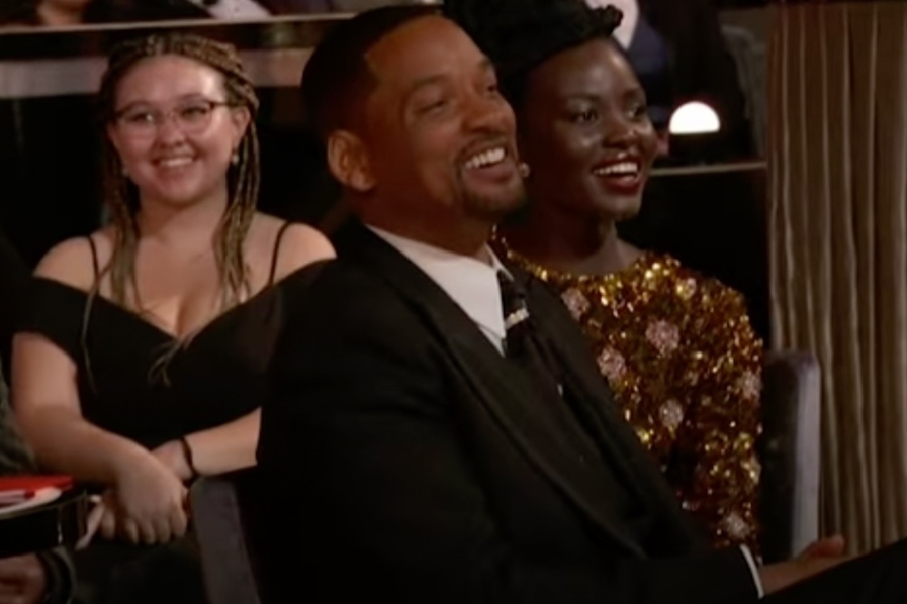 Will Smith appeared to laugh at Chris Rock's G.I. Jane joke at the expense of his wife