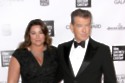 Pierce Brosnan and Keely Shaye Smith (Credit: Famous)