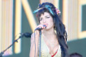 Amy Winehouse is one of the four BRIT School winners