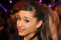 Ariana Grande covers up badly damaged hair with extensions