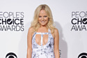 Malin Akerman put on some front in her revealing dress