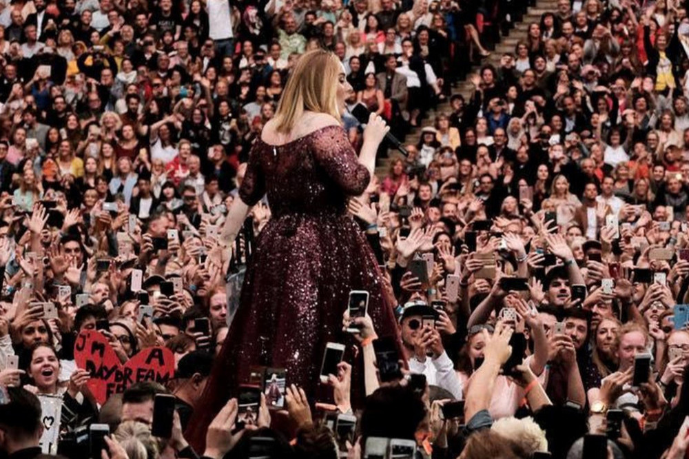 Adele performing at Wembley Stadium in 2017