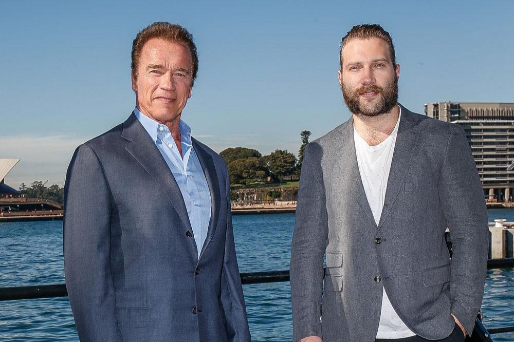 Arnold Schwarzenegger with Jai Courtney