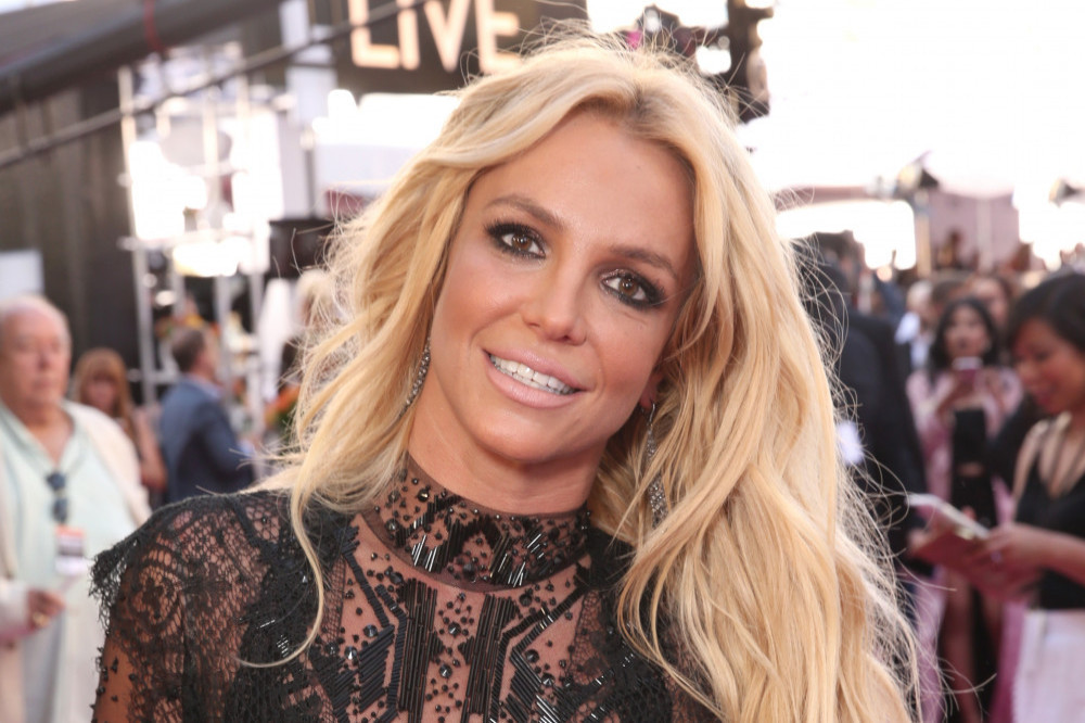 Britney Spears was seen chatting about new music, according to a source