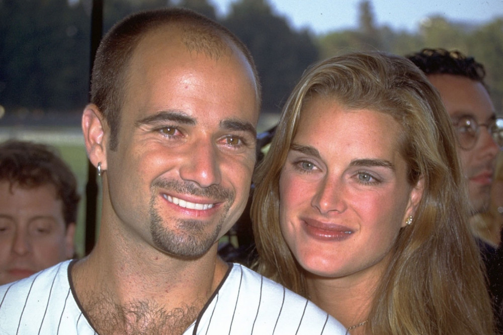 Brooke Shields says her ex-husband Andre Agassi smashed all his tennis trophies in a drug-fuelled fit of jealous rage after watching her film her finger-licking role in ‘Friends’