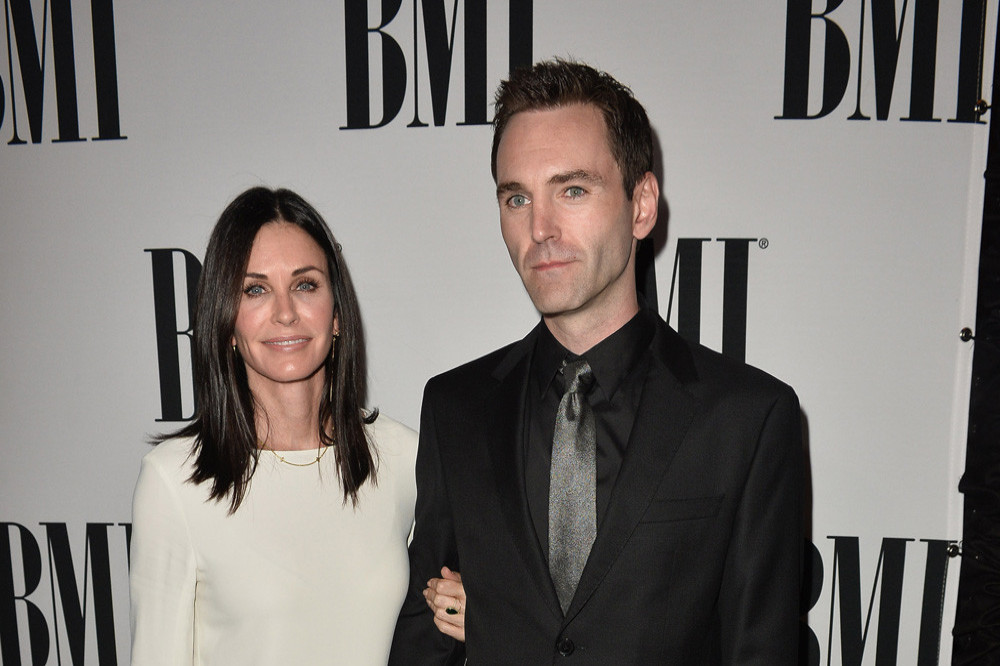 Courtney Cox reveals how a string of celebrity friends got her together with Johnny McDaid