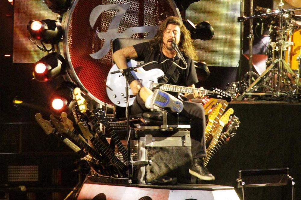 Dave Grohl on stage in Toronto with his broken leg