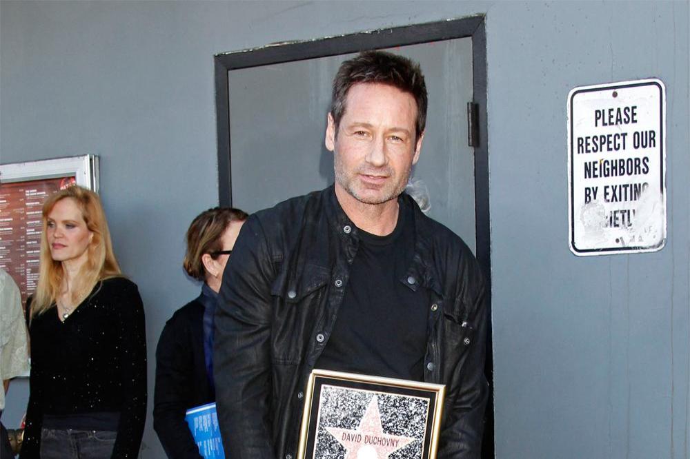 David Duchovny with this star on the Hollywood Walk of Fame
