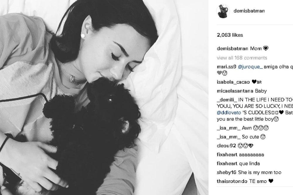 Demi Lovato with Batman (c) Instagram