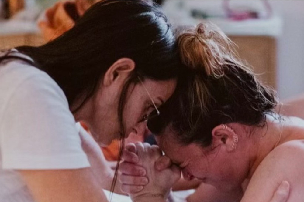 Demi Moore has posted a snap of her daughter Rumer in the agonising throes of labour to celebrate the actress’ 35th birthday