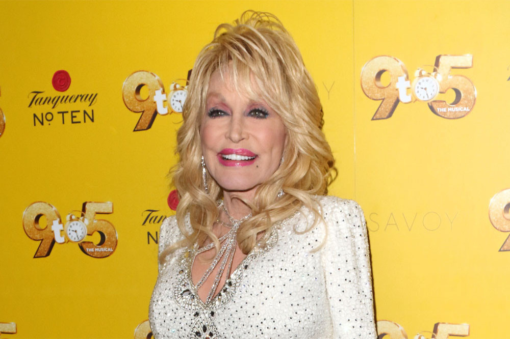 Dolly Parton founded her book charity for her dad
