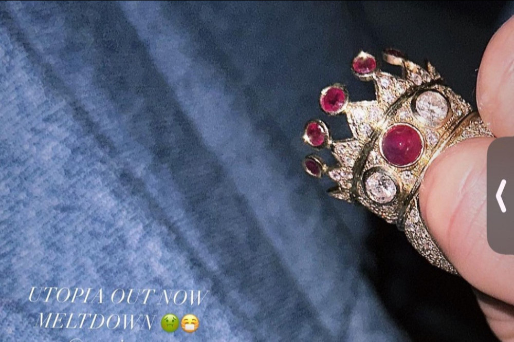 Drake splurged $1.01 million for a huge gold, ruby and diamond crown ring created and worn by Tupac Shakur