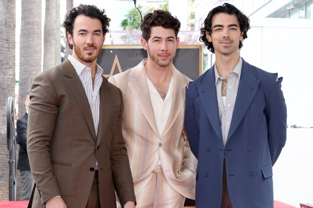 The Jonas Brothers got their dad on stage for a song during their show in Nashville