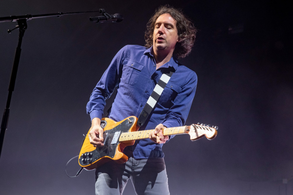 Gary Lightbody had to wait for his burps to subside before re-starting the song