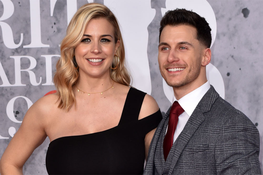 Pregnant star Gemma Atkinson shaves her baby bump every day