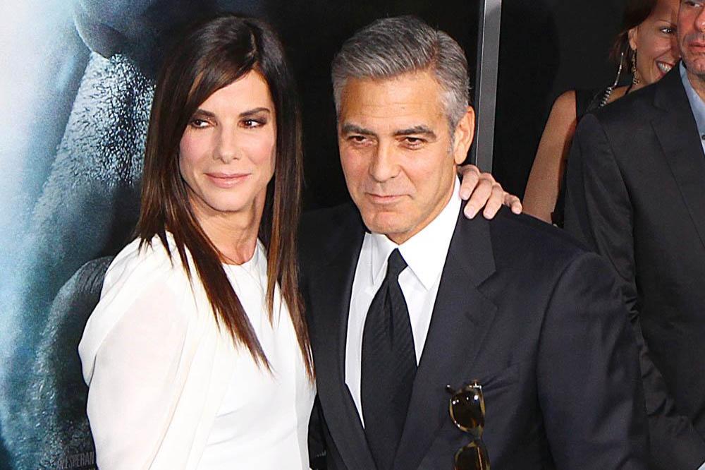 Sandra Bullock with George Clooney