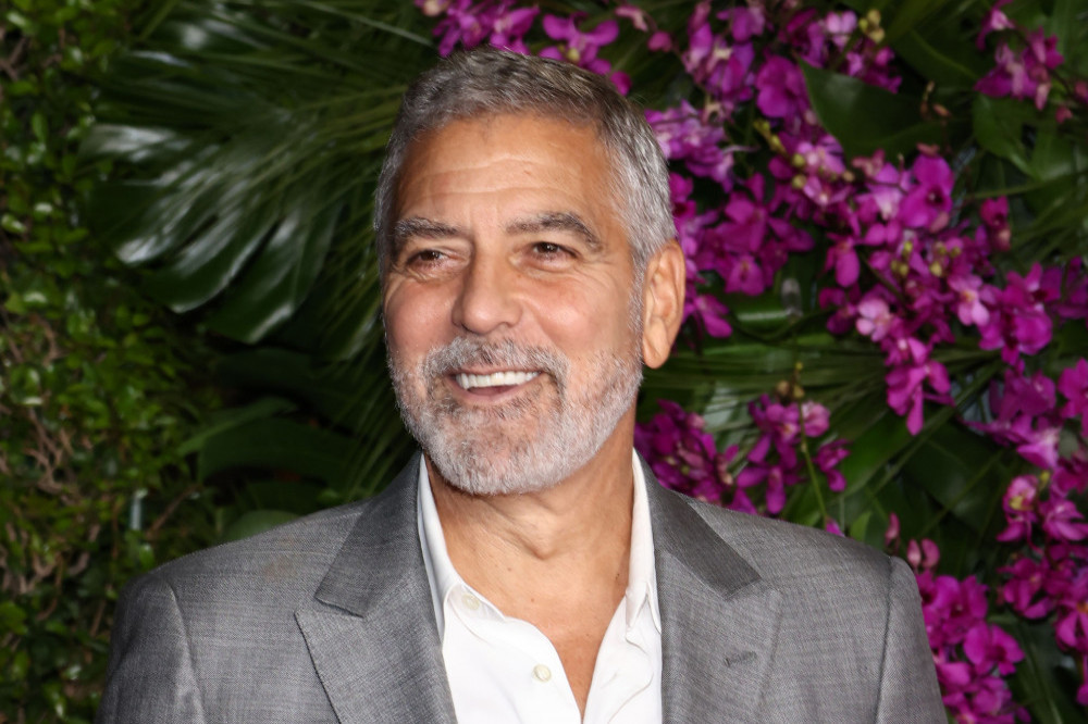 George Clooney's children have a different idea of what he does for work