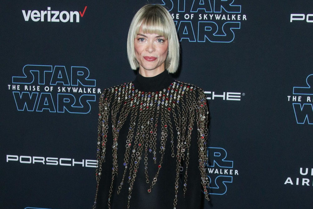 Jaime King has reached an agreement in her divorce