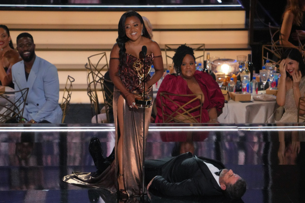 Jimmy Kimmel stayed on the floor while Quinta Brunson accepted her Emmy