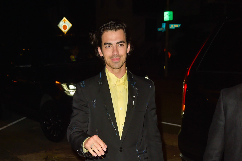 Joe Jonas shed a tear while thanking his fans before singing the song he wrote for his estranged wife Sophie Turner