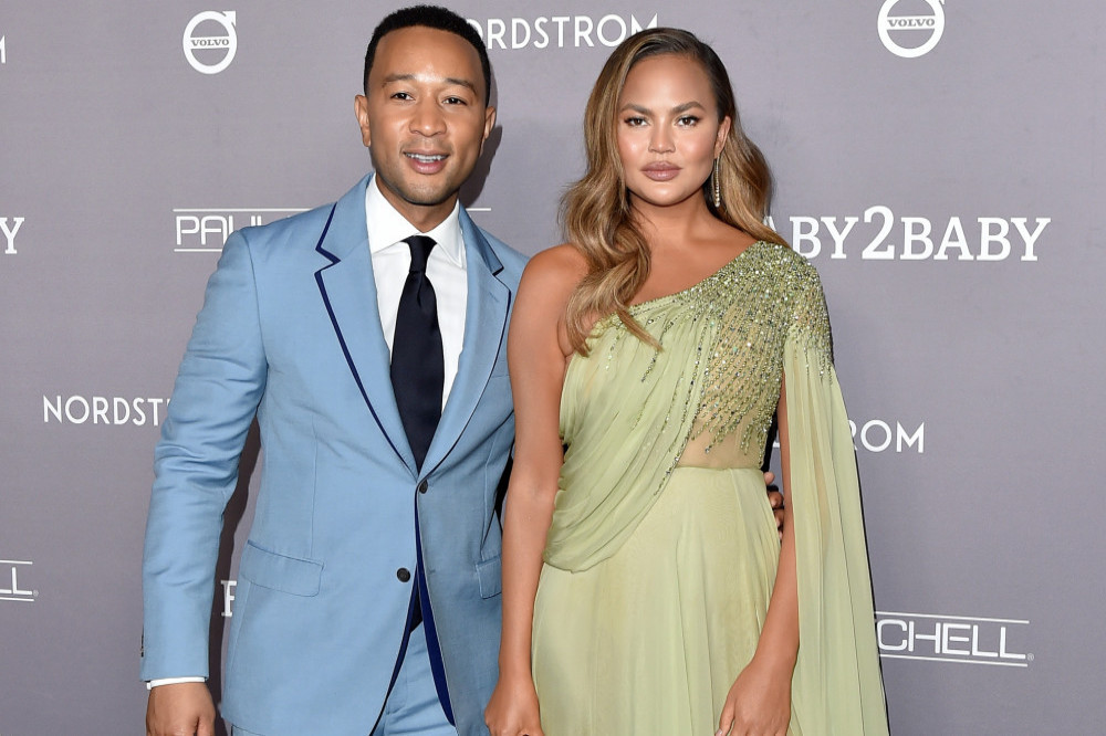 John Legend and Chrissy Teigen are excited by their new arrival
