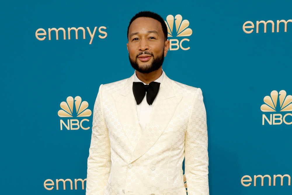 John Legend is hands-on with his baby daughter