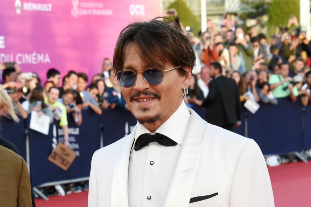 Johnny Depp reaches settlement in 'City of Lies' lawsuit