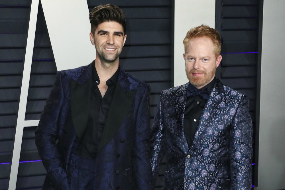 Justin Mikita and Jesse Tyler Ferguson have two sons
