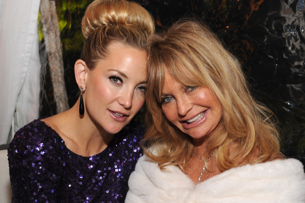 Kate Hudson has insisted she doesn't care if people think she forged a career on the back of her mother Goldie Hawn's success
