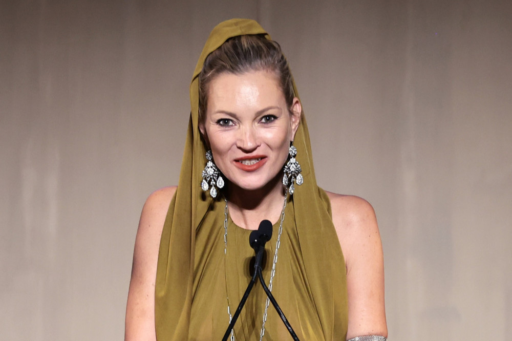 Kate Moss appeared to stumble through speech at awards ceremony