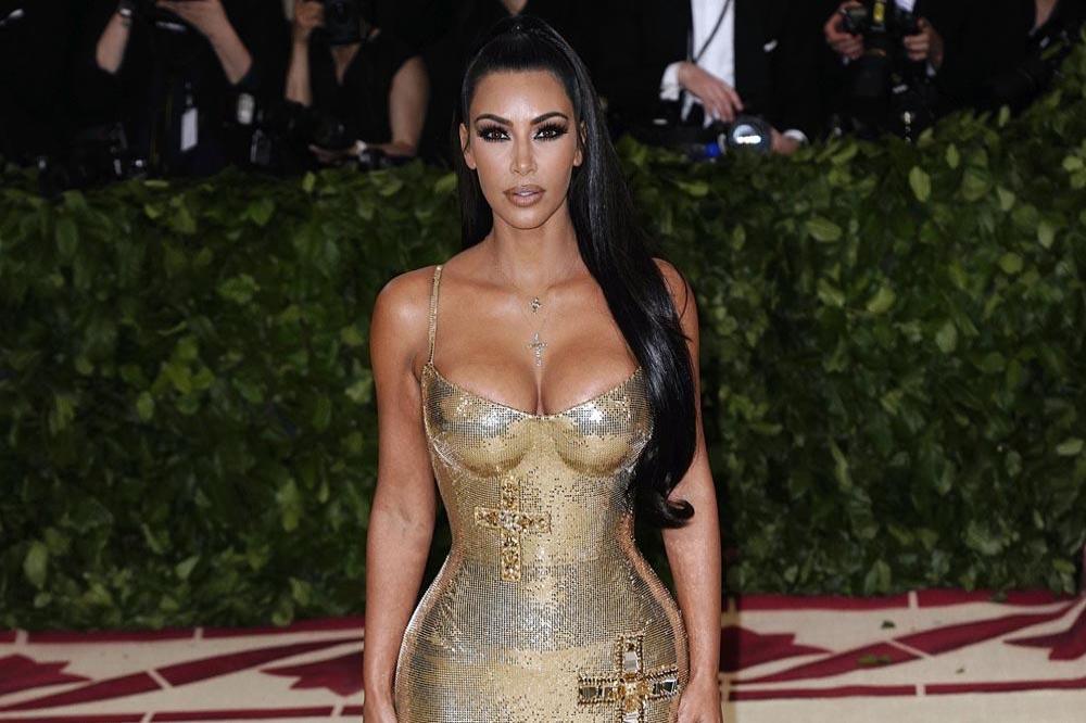 Kim Kardashian West in her gold Versace gown 