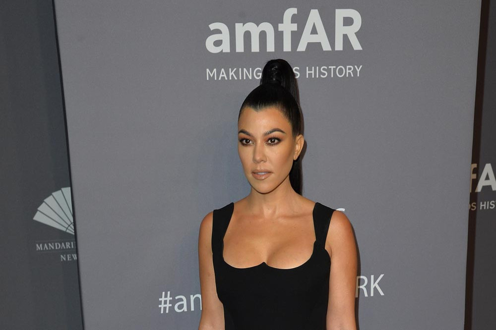 Kourtney Kardashian was encouraged to walk down the aisle