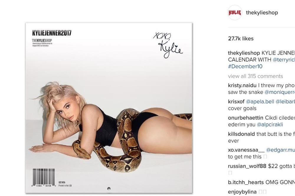 Kylie Jenner posing with python for calendar