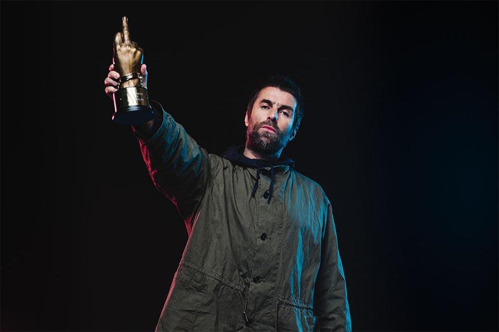 Liam Gallagher with his NME Godlike Genius Award (c) Danny North