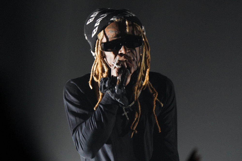 Lil Wayne's fans chanted his nickname for a while before the house lights came up