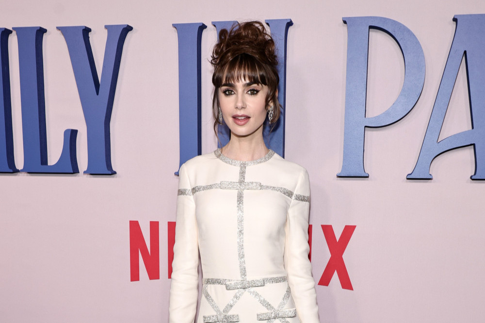 Lily Collins is plunged into anxiety by memories of an abusive ex who branded her a ‘whore‘