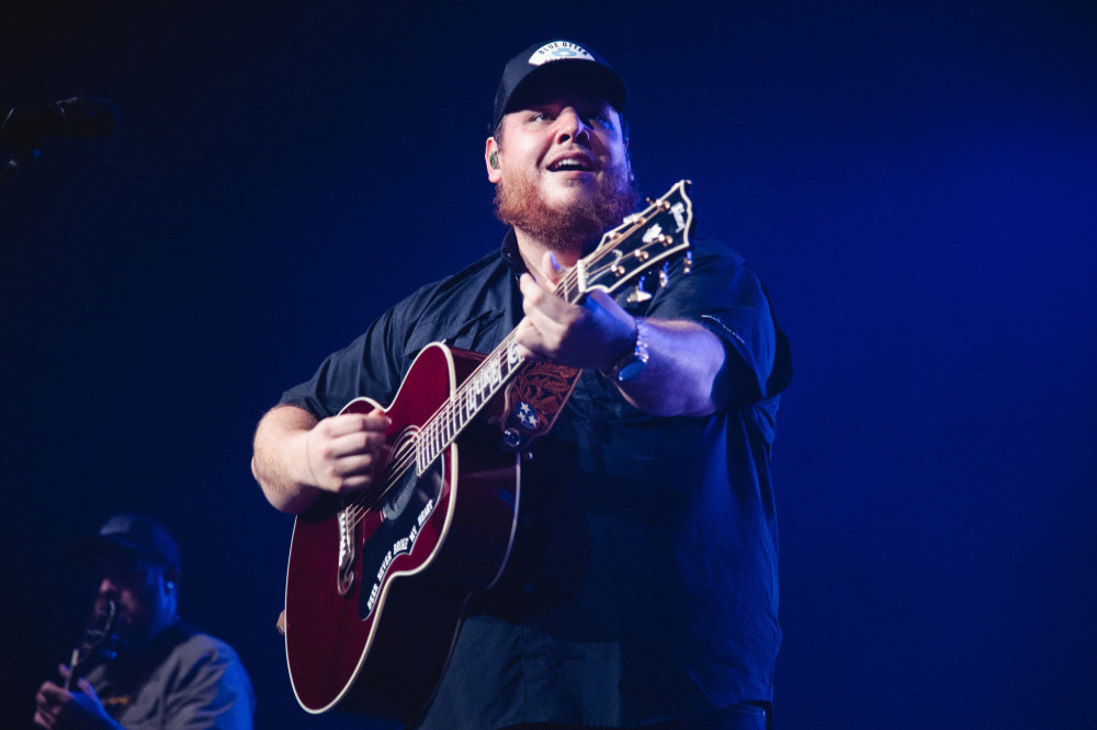 Luke Combs is glad to have Tracy Chapman's approval