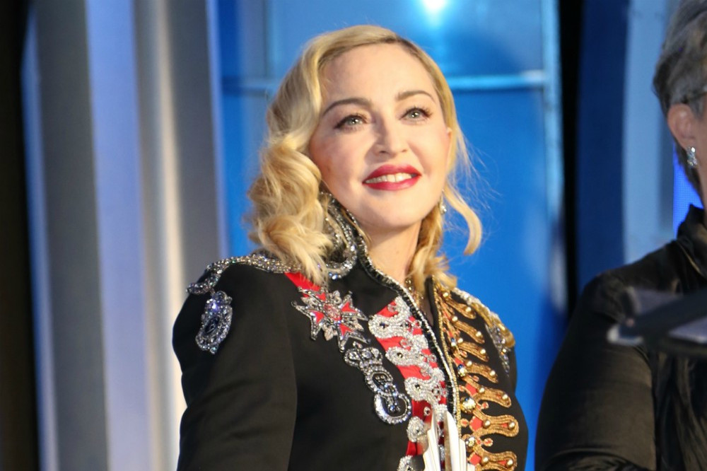 Madonna says her son looks better than her in her own clothes