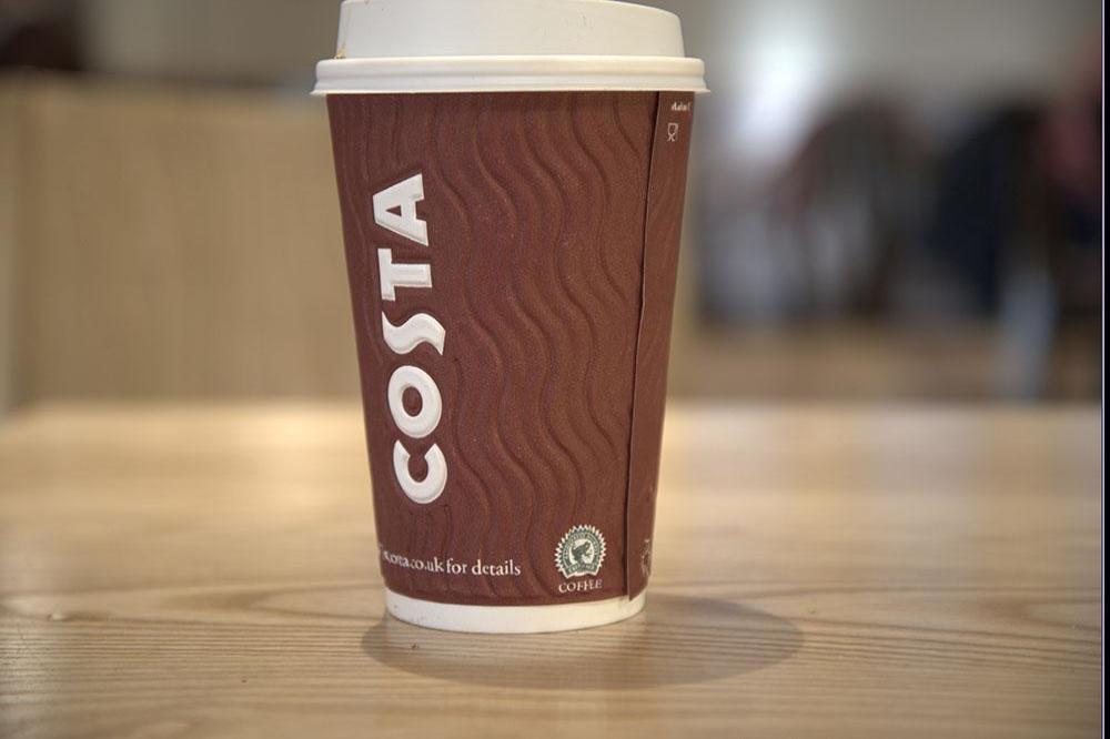 Man gets Costa cup tattooed on his arm