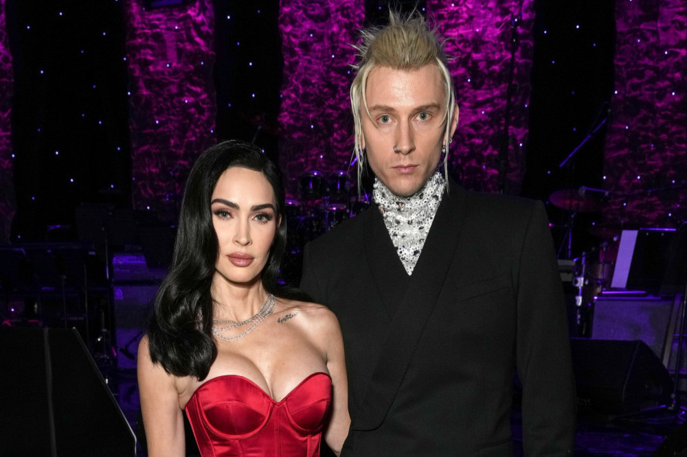 Megan Fox is said to be keeping Machine Gun Kelly ‘in the dog house‘