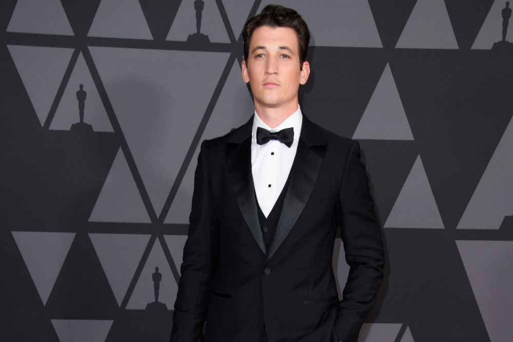 Miles Teller's wife cried while watching him dance with Taylor Swift.