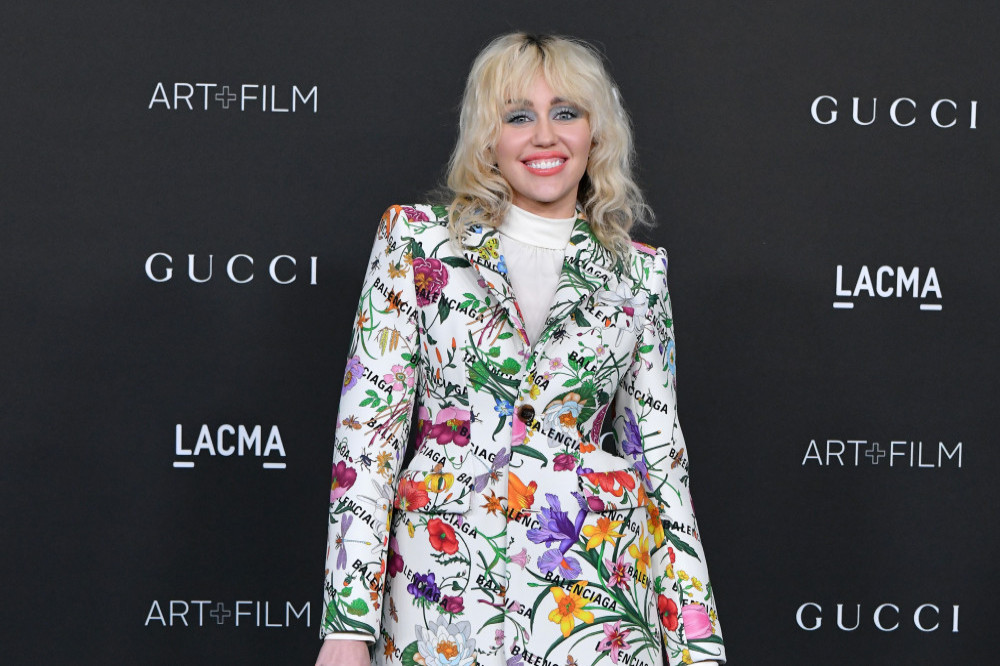 Miley Cyrus joins cast of godmother Dolly Parton's festive film