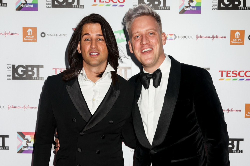 Ollie Locke and his husband Gareth are expecting twins