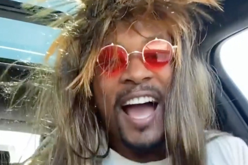 Patrice Evra dressed as Tina Turner to pay tribute to the late music icon